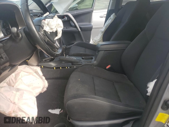 2018 Toyota RAV4 XLE with VIN JTMWFREV0JJ191707, listed as a Copart auction lot 57821575 with Not provided miles and Salvage title. Bid and sale history available at DreamBid. Image 7.