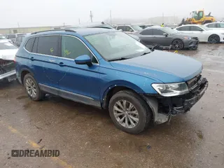 2018 Volkswagen Tiguan SEL z VIN 3VV3B7AX8JM027006, wystawiony jako IAAI lot #41423398 z przebiegiem 77 428 mil mil oraz . Historia ofert i sprzedaży dostępna na DreamBid. Obrazek 1.