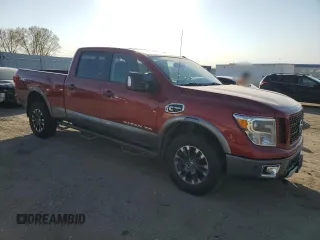 2016 Nissan Titan XD PRO-4X with VIN 1N6BA1F43GN512559, listed as a Copart auction lot 76691104 with 0 mi miles and Salvage Title. Bid and sale history available at carsss.com. Image 4.