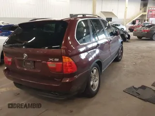 2001 BMW X5 4.4i with VIN WBAFB33561LH24532, listed as a IAAI auction lot 41611503 with 188,671 mi miles. Bid and sale history available at carsss.com. Image 4.