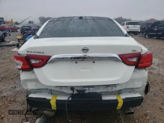 2016 Nissan Maxima SL with VIN 1N4AA6AP7GC905950, listed as a Copart auction lot 77975563 with 74,157 mi miles and Salvage Title. Bid and sale history available at DreamBid. Image 6.
