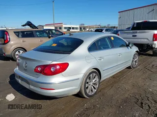 2012 Volkswagen CC Sport z VIN WVWMN7AN3CE506483, wystawiony jako IAAI lot #41401237 z przebiegiem 135 296 mil mil oraz . Historia ofert i sprzedaży dostępna na DreamBid. Obrazek 4.