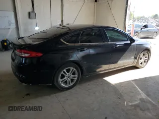 2018 Ford Fusion SE z VIN 3FA6P0HDXJR130677, wystawiony jako Copart lot #51737345 z przebiegiem 129 918 mil mil oraz Szkoda całkowita • Salvage title. Historia ofert i sprzedaży dostępna na DreamBid. Obrazek 3.