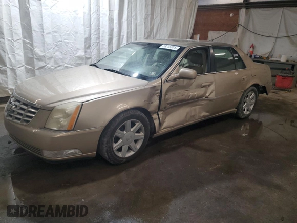 2006 Cadillac DTS 1SC z VIN 1G6KD57Y76U141402, wystawiony jako Copart lot #58715675 z przebiegiem 148 042 mil mil oraz Szkoda całkowita • Salvage title. Historia ofert i sprzedaży dostępna na DreamBid. Obrazek 1.