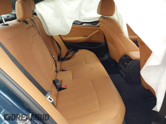 2023 BMW 5 Series 530e z VIN WBA13AG07PCL21918, wystawiony jako IAAI lot #41890108 z przebiegiem 20 790 mil mil oraz . Historia ofert i sprzedaży dostępna na DreamBid. Obrazek 8.