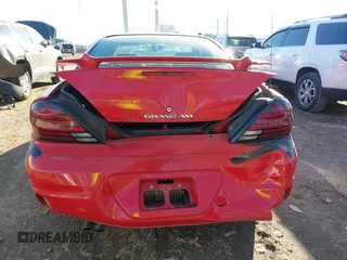 2004 Pontiac Grand Am SE2 with VIN 1G2NG52E84M672446, listed as a IAAI auction lot 40834541 with 209,231 mi miles. Bid and sale history available at carsss.com. Image 16.