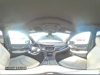 2021 Cadillac XT6 Sport z VIN 1GYKPGRS0MZ215942, wystawiony jako Copart lot #84830084 z przebiegiem 29 930 mil mil oraz Szkoda całkowita • Salvage title. Historia ofert i sprzedaży dostępna na DreamBid. Obrazek 13.
