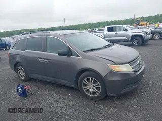 2012 Honda Odyssey EX-L with VIN 5FNRL5H64CB060468, listed as a IAAI auction lot 42182501 with 236,399 mi miles and . Bid and sale history available at carsss.com. Image 13.