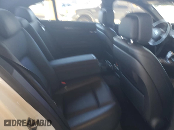 2014 BMW 7 Series 740i with VIN WBAYA6C59ED144122, listed as a Copart auction lot 75059334 with 78,090 mi miles and Salvage Title. Bid and sale history available at carsss.com. Image 10.