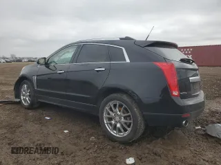 2014 Cadillac SRX Luxury Collection z VIN 3GYFNEE34ES685593, wystawiony jako Copart lot #52202805 z przebiegiem 139 869 mil mil oraz Szkoda całkowita • Salvage title. Historia ofert i sprzedaży dostępna na DreamBid. Obrazek 2.