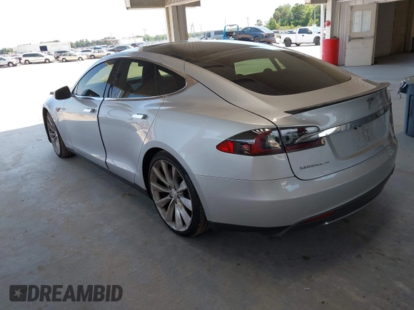 2013 Tesla Model S Performance with VIN 5YJSA1DP6DFP07999, listed as a IAAI auction lot 42284612 with 123,261 mi miles and . Bid and sale history available at DreamBid. Image 3.