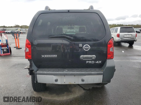 2014 Nissan Xterra X with VIN 5N1AN0NW5EN815643, listed as a Copart auction lot 85413894 with 43,413 mi miles and Salvage Title. Bid and sale history available at DreamBid. Image 6.