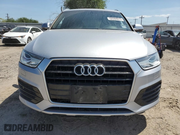 2018 Audi Q3 Premium z VIN WA1BCCFS3JR016890, wystawiony jako Copart lot #52594015 z przebiegiem 63 871 mil mil oraz Szkoda całkowita • Salvage title. Historia ofert i sprzedaży dostępna na DreamBid. Obrazek 5.