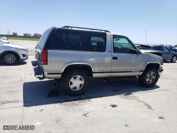 1999 Chevrolet Tahoe with VIN 3GNEK18RXXG190783, listed as a Copart auction lot 52666545 with 240,094 mi miles and Salvage Title. Bid and sale history available at carsss.com. Image 3.