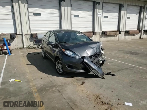 2019 Ford Fiesta SE z VIN 3FADP4BJ5KM146863, wystawiony jako Copart lot #52404965 z przebiegiem 61 286 mil mil oraz Szkoda całkowita • Salvage title. Historia ofert i sprzedaży dostępna na DreamBid. Obrazek 10.