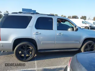 2010 GMC Yukon SLT with VIN 1GKUCCE00AR255901, listed as a IAAI auction lot 42149960 with 196,014 mi miles. Bid and sale history available at carsss.com. Image 13.