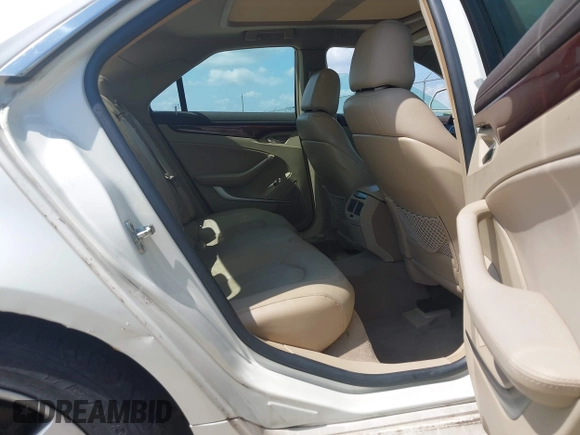 2009 Cadillac CTS AWD z VIN 1G6DS57V690103191, wystawiony jako IAAI lot #42418891 z przebiegiem 151 562 mil mil oraz . Historia ofert i sprzedaży dostępna na DreamBid. Obrazek 8.