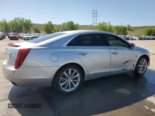 2013 Cadillac XTS Luxury with VIN 2G61R5S32D9131914, listed as a Copart auction lot 56569505 with 123,427 mi miles and Salvage title. Bid and sale history available at DreamBid. Image 3.