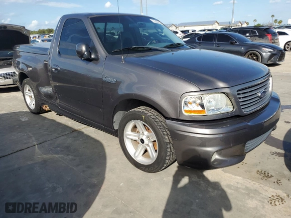 2003 Ford F-150 Lightning with VIN 2FTRF07303CA45572, listed as a Copart auction lot 74384694 with 0 mi miles and Salvage Title. Bid and sale history available at carsss.com. Image 4.