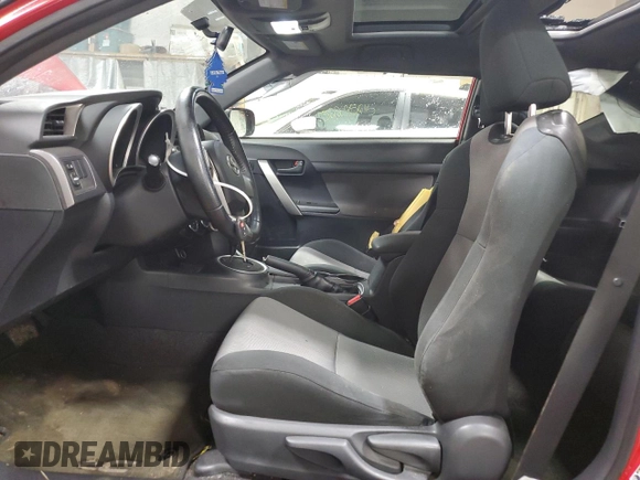 2014 Scion tC z VIN JTKJF5C71E3072025, wystawiony jako Copart lot #51967285 z przebiegiem 187 091 mil mil oraz Szkody całkowita. Historia ofert i sprzedaży dostępna na DreamBid. Obrazek 7.