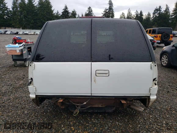 1997 Chevrolet Tahoe z VIN 3GNEC18R7VG122449, wystawiony jako Copart lot #85718304 z przebiegiem Nie podano mil oraz Szkoda całkowita • Salvage title. Historia ofert i sprzedaży dostępna na DreamBid. Obrazek 6.