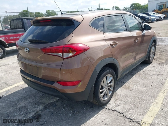2016 Hyundai Tucson SE with VIN KM8J23A4XGU180300, listed as a IAAI auction lot 42123067 with 123,804 mi miles. Bid and sale history available at carsss.com. Image 4.