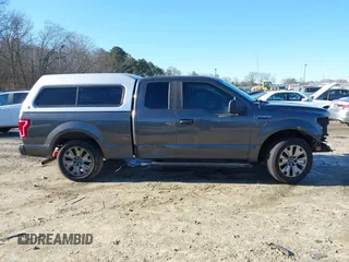 2015 Ford F-150 XL with VIN 1FTEX1C85FKD46390, listed as a IAAI auction lot 41367960 with 209,889 mi miles. Bid and sale history available at carsss.com. Image 14.