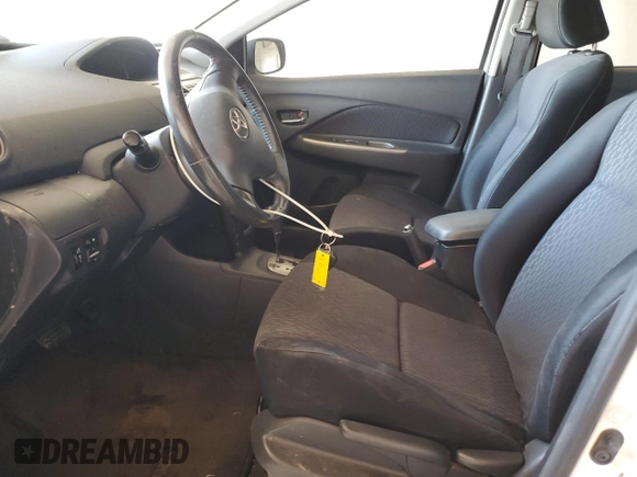 2010 Toyota Yaris с VIN JTDBT4K39A1362693, выставлен на аукционе Copart как лот 56031435 с пробегом 220 592 миль миль и Списание • Salvage title. История ставок и продаж доступна на DreamBid. Изображение 7.