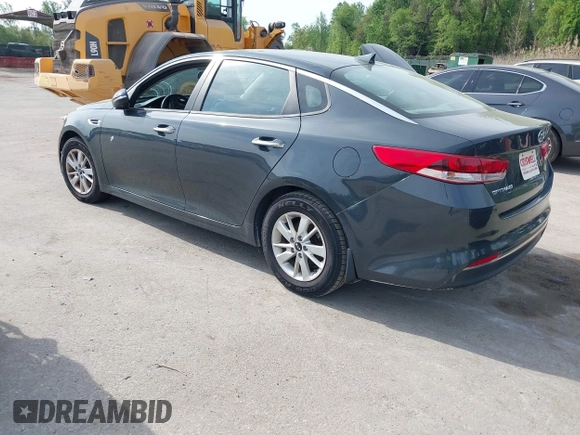 2016 Kia Optima LX with VIN KNAGT4L37G5073752, listed as a IAAI auction lot 42132621 with 136,818 mi miles. Bid and sale history available at carsss.com. Image 3.