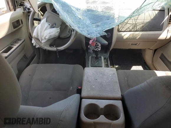 2011 Ford Escape XLS с VIN 1FMCU0C77BKB53875, выставлен на аукционе Copart как лот 53185705 с пробегом 222 070 миль миль и Списание • Salvage title. История ставок и продаж доступна на DreamBid. Изображение 8.