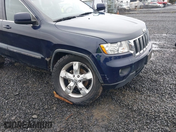2012 Jeep Grand Cherokee Laredo with VIN 1C4RJFAG9CC220145, listed as a IAAI auction lot 41798457 with 130,603 mi miles. Bid and sale history available at carsss.com. Image 6.