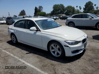 2015 BMW 3 Series 328i with VIN WBA3C1C56FK122177, listed as a Copart auction lot 57333625 with 102,399 mi miles and Salvage title. Bid and sale history available at DreamBid. Image 4.