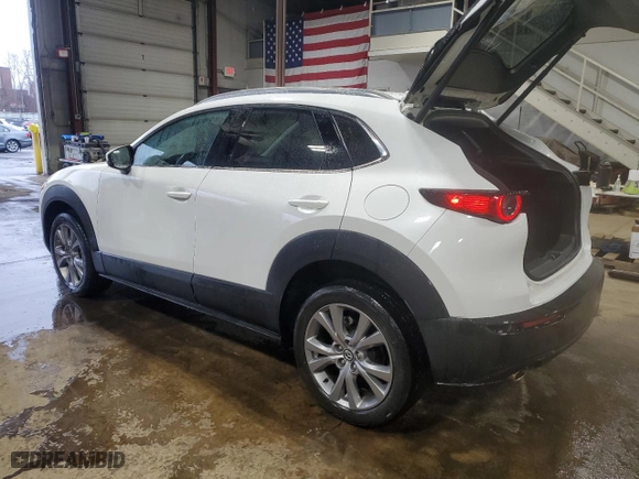 2021 Mazda CX-30 Premium with VIN 3MVDMBDM0MM215197, listed as a Copart auction lot 50207265 with 27,353 mi miles and Salvage Title. Bid and sale history available at carsss.com. Image 2.