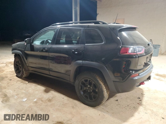 2022 Jeep Cherokee Trailhawk with VIN 1C4PJMBX5ND526816, listed as a Copart auction lot 87394464 with 25,070 mi miles and Salvage Title. Bid and sale history available at carsss.com. Image 2.