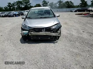2015 Honda Fit EX-L with VIN 3HGGK5H87FM737610, listed as a Copart auction lot 62466515 with 103,454 mi miles and Salvage title. Bid and sale history available at DreamBid. Image 14.