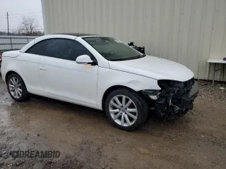 2007 Volkswagen Eos 2.0T with VIN WVWFA71F57V052000, listed as a Copart auction lot 87598495 with 128,610 mi miles and Salvage Title. Bid and sale history available at DreamBid. Image 4.