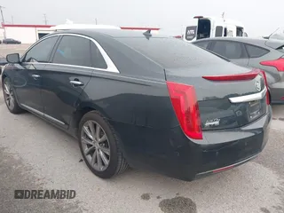 2014 Cadillac XTS z VIN 2G61L5S32E9326141, wystawiony jako IAAI lot #42300854 z przebiegiem 200 284 mil mil oraz . Historia ofert i sprzedaży dostępna na DreamBid. Obrazek 3.