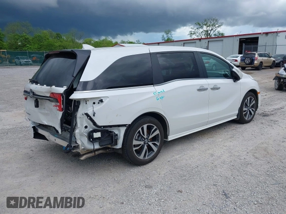2023 Honda Odyssey Touring with VIN 5FNRL6H88PB079716, listed as a IAAI auction lot 42208628 with 26,679 mi miles and . Bid and sale history available at DreamBid. Image 4.