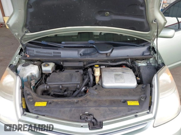 2007 Toyota Prius with VIN JTDKB20U077578859, listed as a IAAI auction lot 41985697 with 185,897 mi miles and . Bid and sale history available at DreamBid. Image 10.