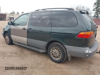 1999 Toyota Sienna LE with VIN 4T3ZF13C1XU098026, listed as a IAAI auction lot 41514367 with 314,638 mi miles. Bid and sale history available at carsss.com. Image 3.