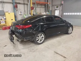 2013 Kia Optima EX z VIN 5XXGN4A77DG257728, wystawiony jako IAAI lot #41735459 z przebiegiem 262 740 mil mil oraz . Historia ofert i sprzedaży dostępna na DreamBid. Obrazek 4.