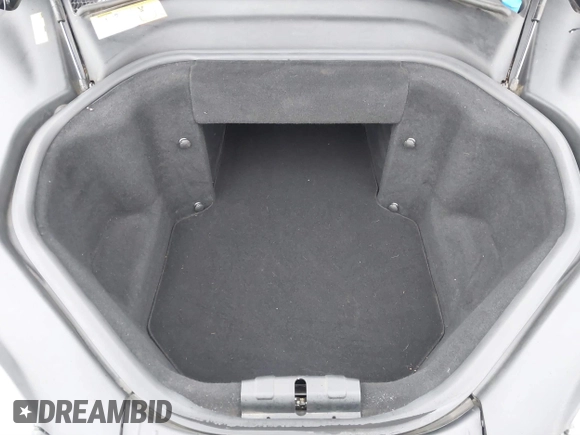 2013 Tesla Model S with VIN 5YJSA1CN0DFP20053, listed as a IAAI auction lot 41470660 with 61,568 mi miles and . Bid and sale history available at DreamBid. Image 10.