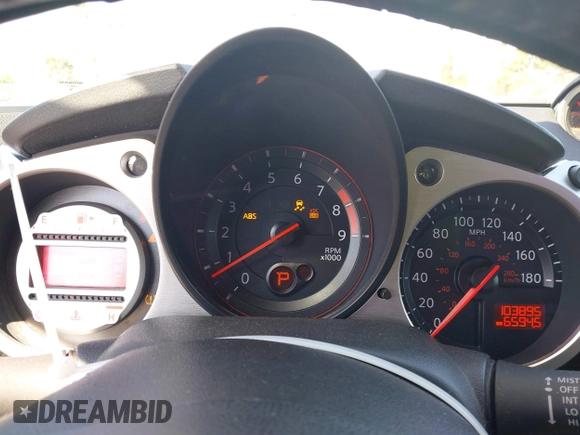2010 Nissan 370Z Touring with VIN JN1AZ4EH6AM506591, listed as a IAAI auction lot 41838902 with 103,895 mi miles. Bid and sale history available at carsss.com. Image 7.