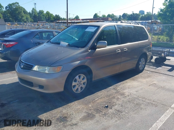 2004 Honda Odyssey EX-L with VIN 5FNRL18044B072819, listed as a IAAI auction lot 42441279 with 264,950 mi miles and . Bid and sale history available at DreamBid. Image 2.