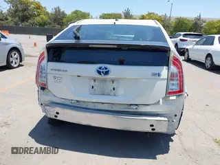 2015 Toyota Prius Four with VIN JTDKN3DU9F0475163, listed as a IAAI auction lot 42630828 with 158,095 mi miles and . Bid and sale history available at DreamBid. Image 16.