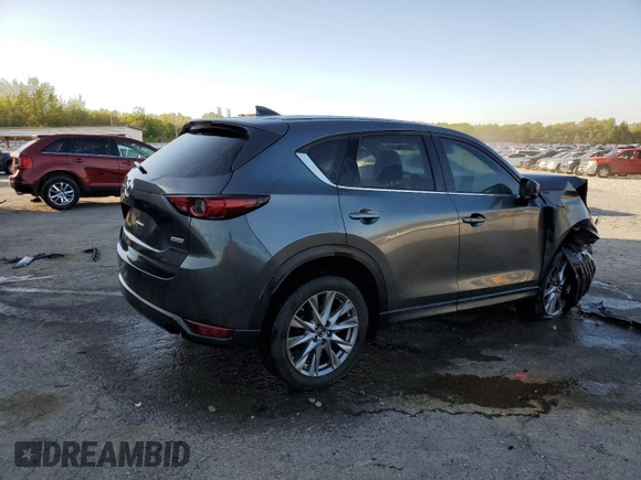 2019 Mazda CX-5 Grand Touring with VIN JM3KFBDM9K0676795, listed as a Copart auction lot 52129885 with 71,869 mi miles and Salvage Title. Bid and sale history available at carsss.com. Image 3.