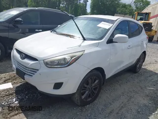 2015 Hyundai Tucson GLS with VIN KM8JT3AF6FU982128, listed as a IAAI auction lot 42227235 with 141,612 mi miles and . Bid and sale history available at DreamBid. Image 2.