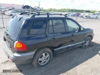 2004 Hyundai Santa Fe GLS with VIN KM8SC13D94U747420, listed as a IAAI auction lot 42091747 with 198,003 mi miles. Bid and sale history available at carsss.com. Image 4.