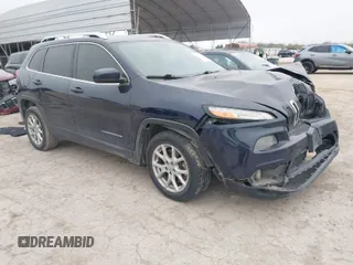 2015 Jeep Cherokee Latitude with VIN 1C4PJLCBXFW531335, listed as a IAAI auction lot 41419077 with 144,488 mi miles. Bid and sale history available at carsss.com. Image 1.