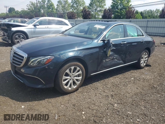2017 Mercedes-Benz E 300 Luxury with VIN WDDZF4KBXHA185598, listed as a Copart auction lot 61011935 with 59,116 mi miles and Salvage title. Bid and sale history available at DreamBid. Image 1.